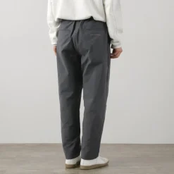 AND WANDER / Nylon Chino Tucked Tapered Pants