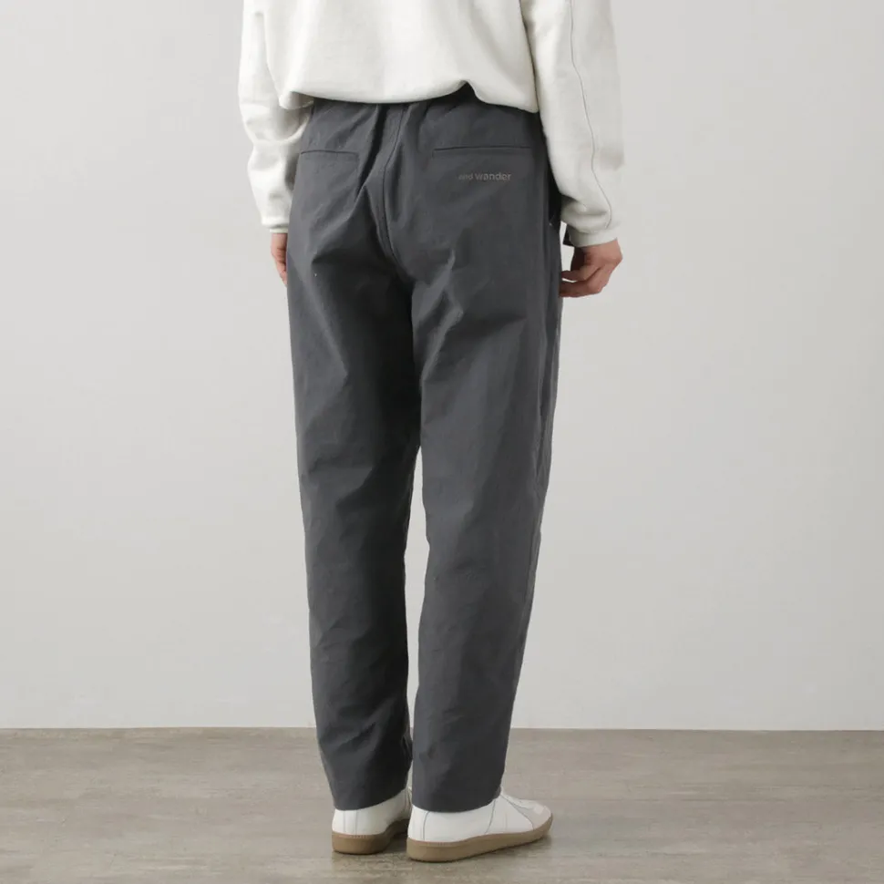 AND WANDER / Nylon Chino Tucked Tapered Pants