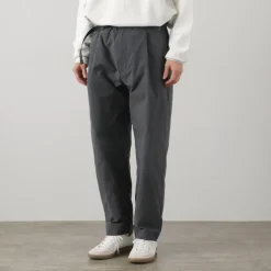 AND WANDER / Nylon Chino Tucked Tapered Pants