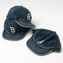 HIGHER / Selvage denim cap with initials badge